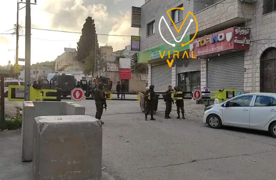 الاحتلال يجبر أصحاب المحلات في حوارة على الإغلاق